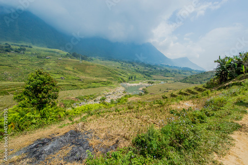 Landscape of Sa Pa  Vietnam  featuring river.
