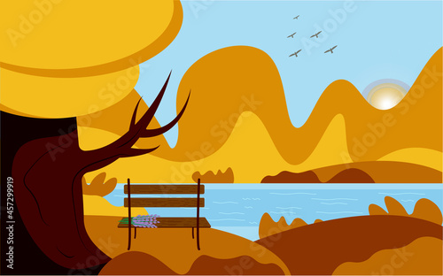 Autumn background of the lake. Autumn park with a bench on which a bouquet of lavender.