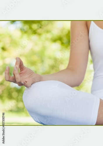 Wallpaper Mural Mid section of a woman practicing yoga in the garden against white background Torontodigital.ca