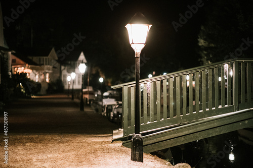 Lamppost in the evening at a bridge  photo