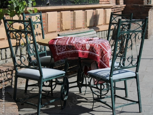 Forged table with chairs on the street