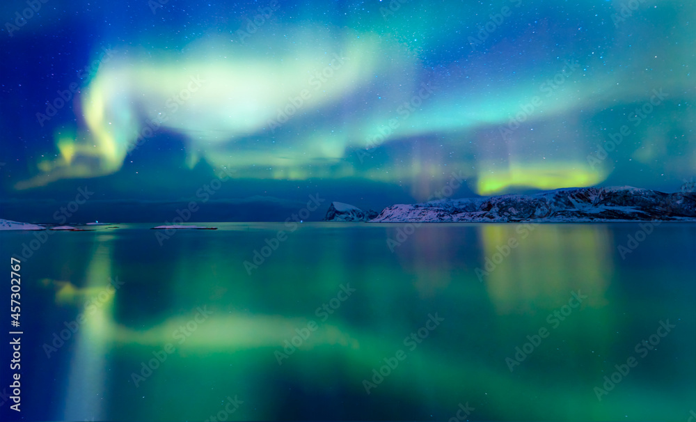 Northern lights or Aurora borealis in the sky over Tromso, Norway