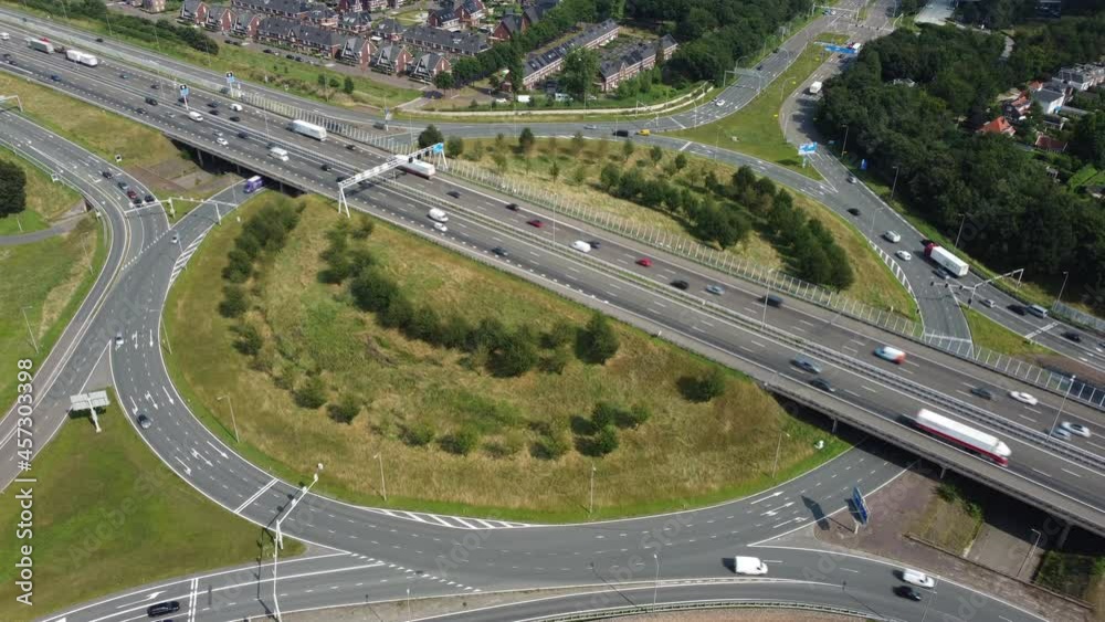 Traffic at a highway junction at Zwolle where the A28 highway runs through the city in Overijssel, The Netherlands. Traffic at a highway junction at Zwolle where the A28 highway runs through the city in Overijssel, The Netherlands.