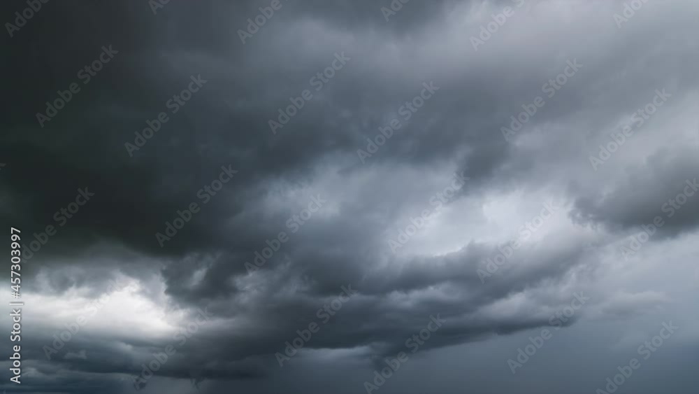 Time lapse, dark storm clouds with background,Dark clouds before a thunder-storm. Time lapse, dark storm clouds with background,Dark clouds before a thunder-storm.