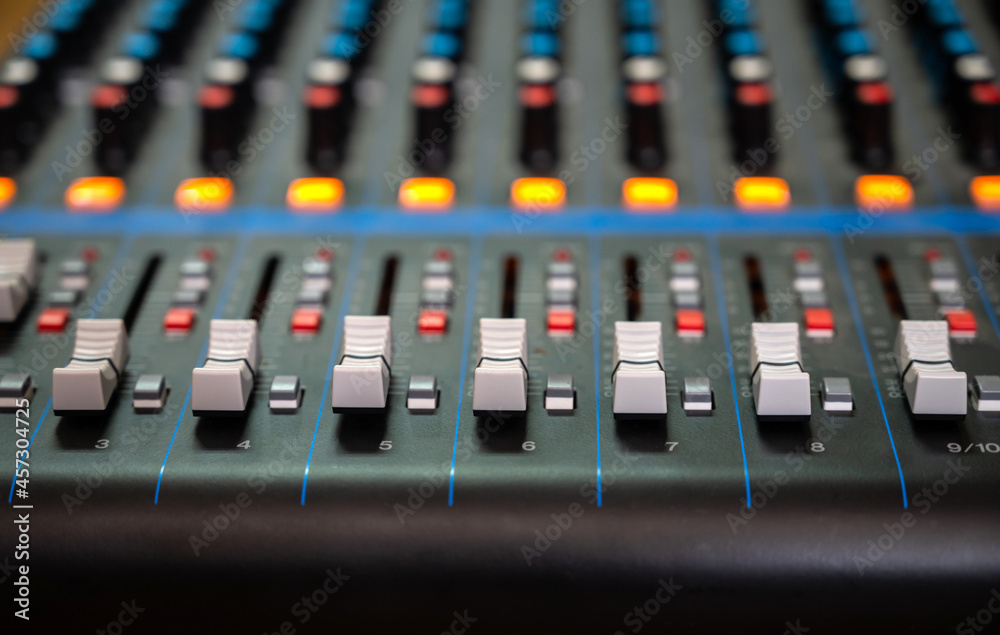 Close up Audio sound mixer with amplifier equipment, sound acoustic musical mixing and engineering concept background, selective focus.