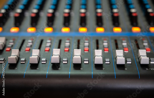 Close up Audio sound mixer with amplifier equipment, sound acoustic musical mixing and engineering concept background, selective focus.