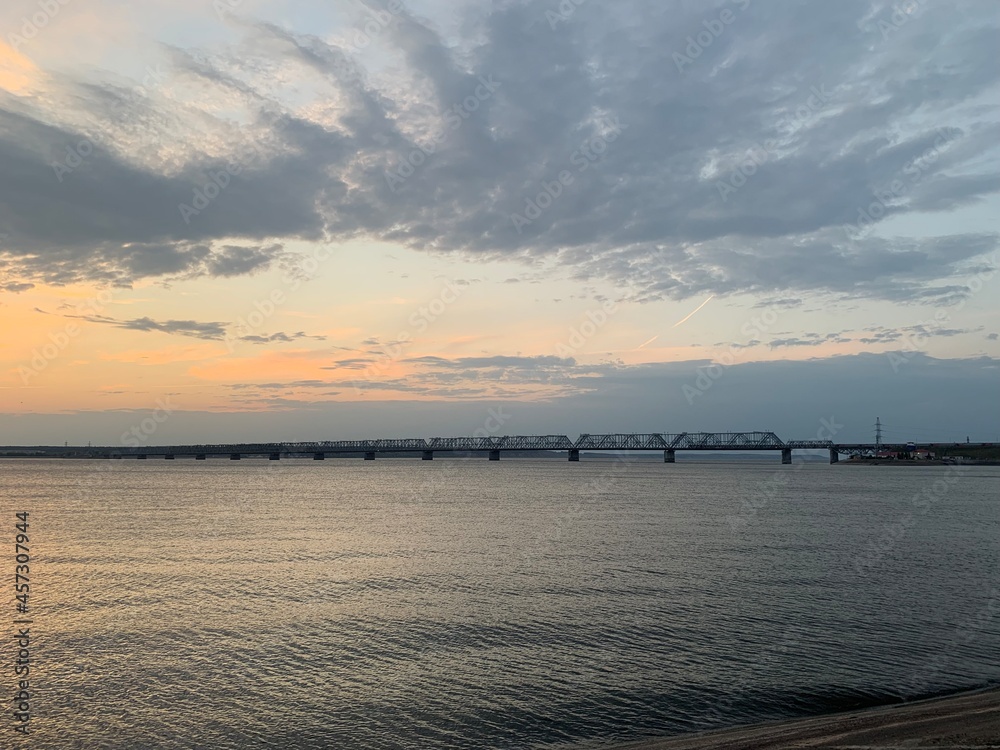 Dawn over the bridge over the Volga river
