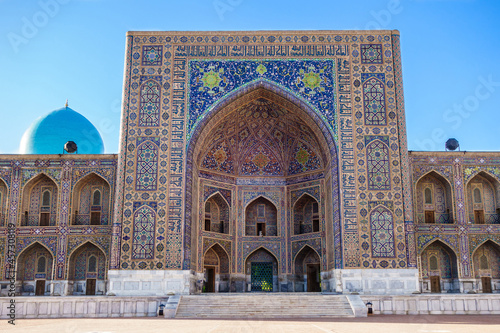 Facade of madrasah Tilya Kori in Samarkand, Uzbekistan. Example of Islamic architecture of XVII century