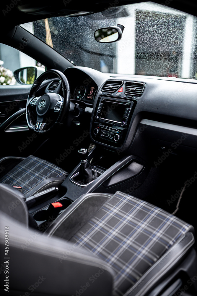 VW Scirocco Interior Of White Coupe Sports Car Light Painted In Home vw-scirocco-interior-of-white-coupe-sports-car-light-painted-in-home