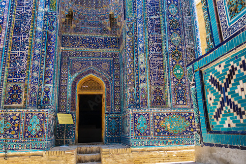 Facade of Shirin Bika mausoleum (Timur's sister), view from side of Shadi Mulk mausoleum (Amir Timur's niece). Both buildings were built in XIV. Historical complex Shah-i Zinda, Samarkand, Uzbekistan photo
