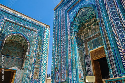 Facades of mausoleums of historical complex Shakhi Zinda, Samarkand, Uzbekistan. On left is mausoleum of Khoja Ahmad, on right is Kutlug Ogo, wife of Amir Timur (Tamerlane)