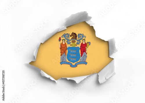 Flag of New Jersey underneath the ripped paper – realistic 3d rendering photo