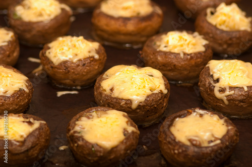 Wallpaper Mural Champignons stuffed with cheese. Champignons stuffed with cheese on a baking sheet Torontodigital.ca