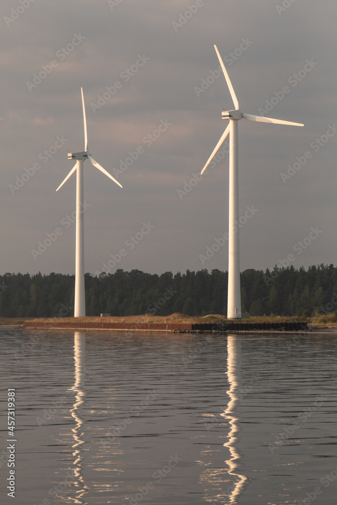 Wind generators are located on the shores of the Baltic Sea. Wind generators are located on the shores of the Baltic Sea.