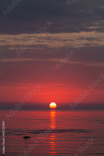 Fototapeta Naklejka Na Ścianę i Meble -  Red sunrise in the baltic sea. Beautiful seascape
