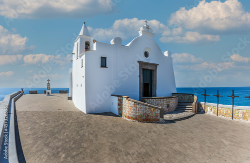 The church of the Madonna del Soccorso is a religious architecture located in Forio in Italy. Island of Ischia. Square with white church. photo
