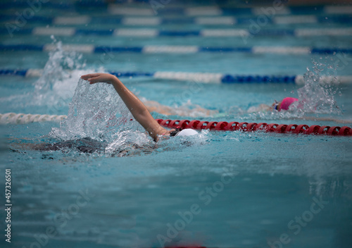 Swimming competition And the boy's arm rotation practice