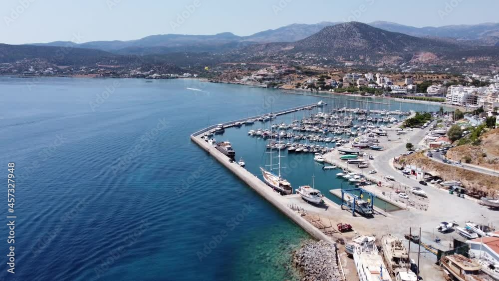 Crete island, Greece. Top view of Lake Voulismeni and the town of Agios Nicholas. Aerial video Crete island, Greece. Top view of Lake Voulismeni and the town of Agios Nicholas. Aerial video
