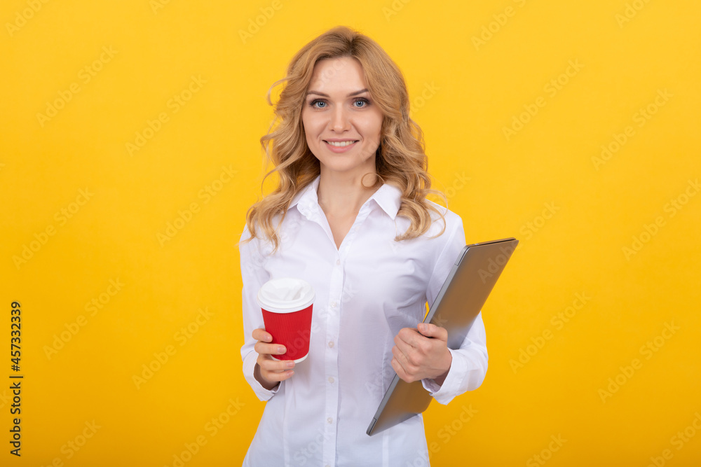 Happy woman teacher with laptop hold takeaway paper cup yellow background, coffee break Happy woman teacher with laptop hold takeaway paper cup yellow background, coffee break
