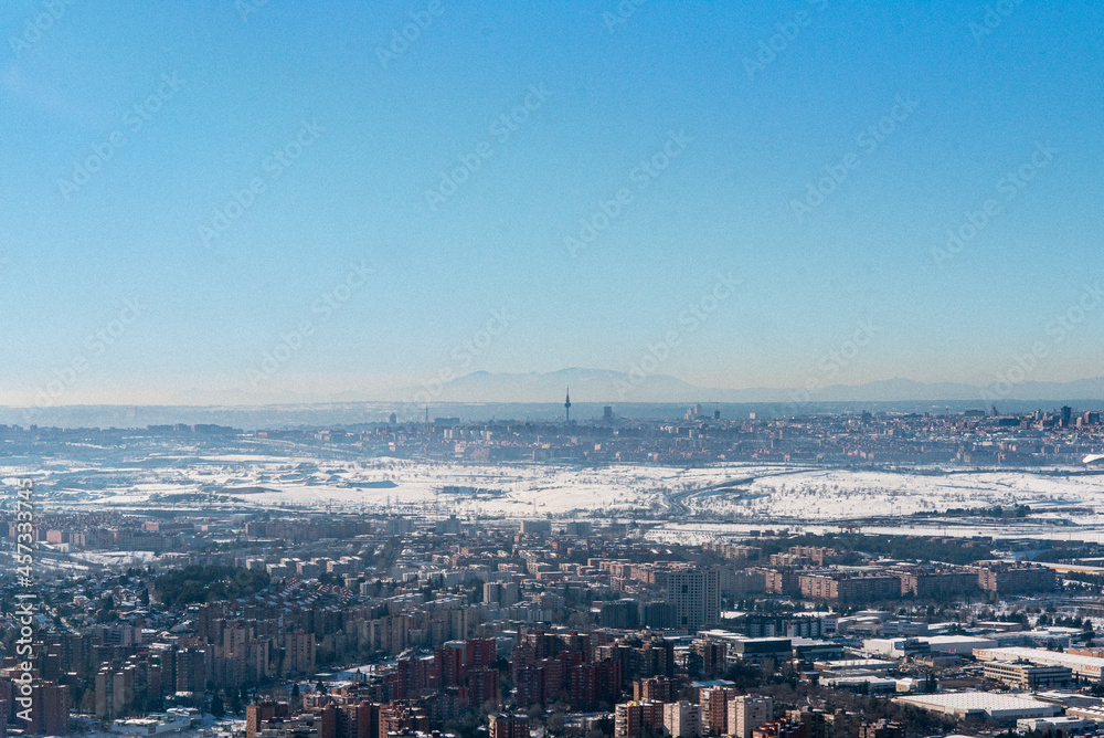 plains snow Madrid empty roads aerial view skyline city