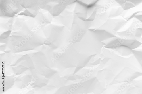 White crumpled paper texture background.