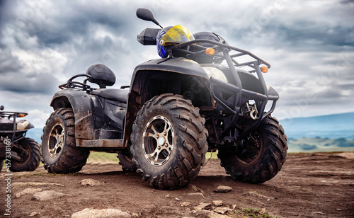 ATV quad bike on forest offroad  summer travel rally