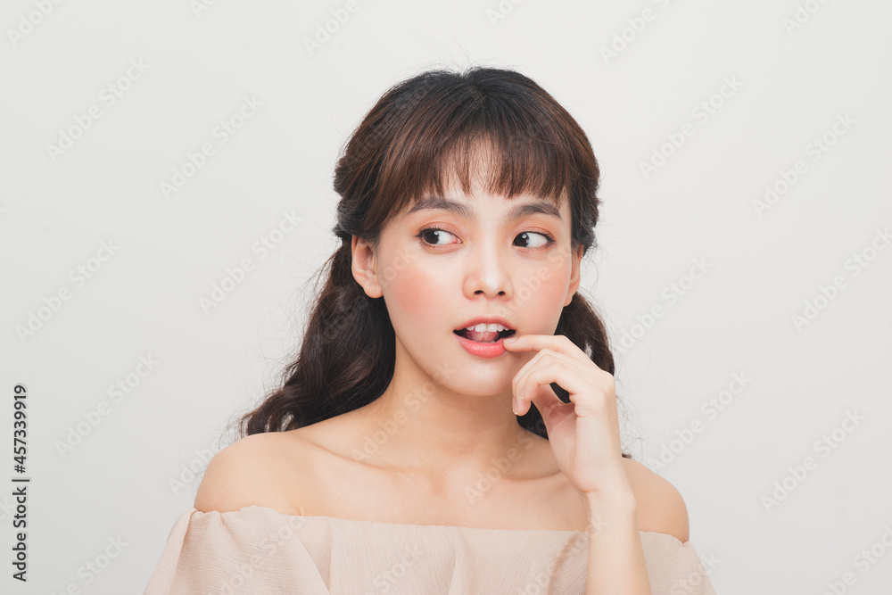 Portrait of young beautiful asian girl with long wavy hair Portrait of young beautiful asian girl with long wavy hair