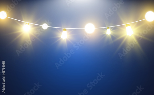 Christmas bright, beautiful lights, design elements. Glowing lights for design of Xmas greeting cards. Garlands, light Christmas decorations.	