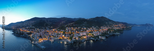  Italy. The towns of Liguria. Night. City lights. Italy mediterranean coast. Aerial view.