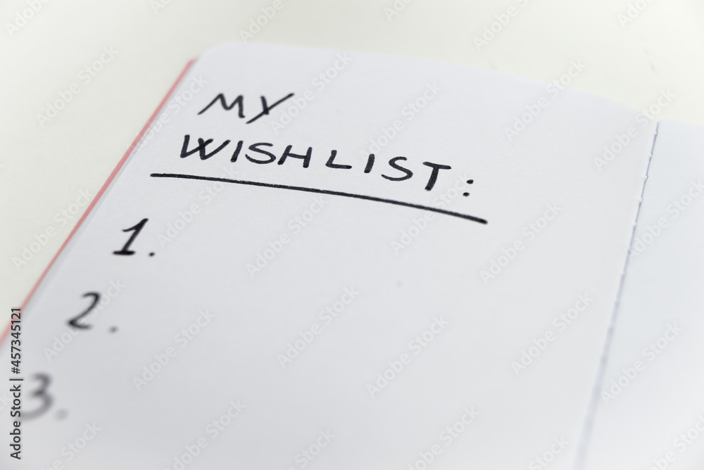 Notebook page marked 'my wishlist' in black ink on white paper. Goals and priorities of one's life.
Notebook page marked 'my wishlist' in black ink on white paper. Goals and priorities of one's life.