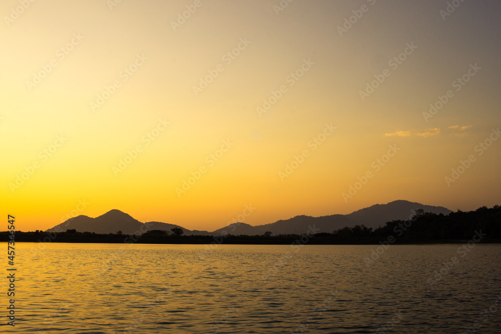 sunset in the sea and mountain in panorama style