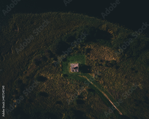 observation tower seen from a drone over the lake