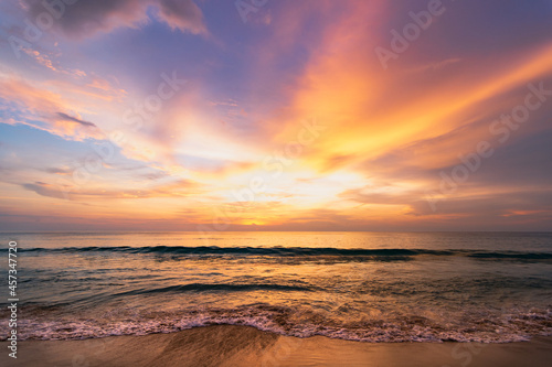 A colorful seascape with a vivid sky background