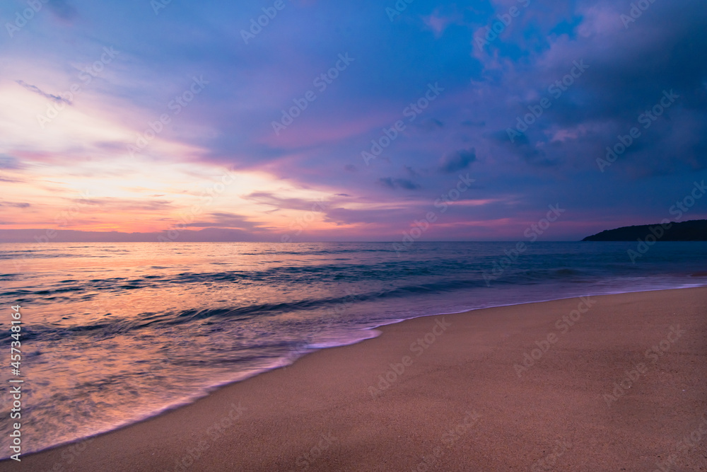 A colorful seascape with  a vivid sky background