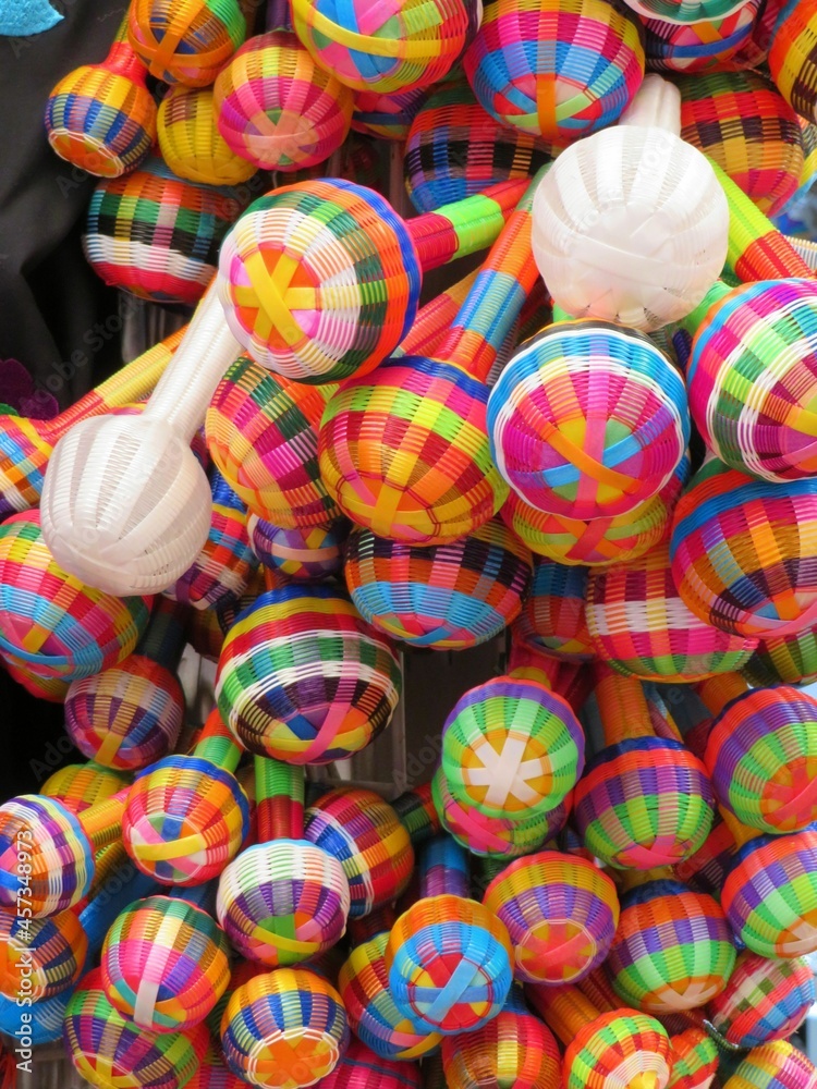 traditional mexican straw toys in a market