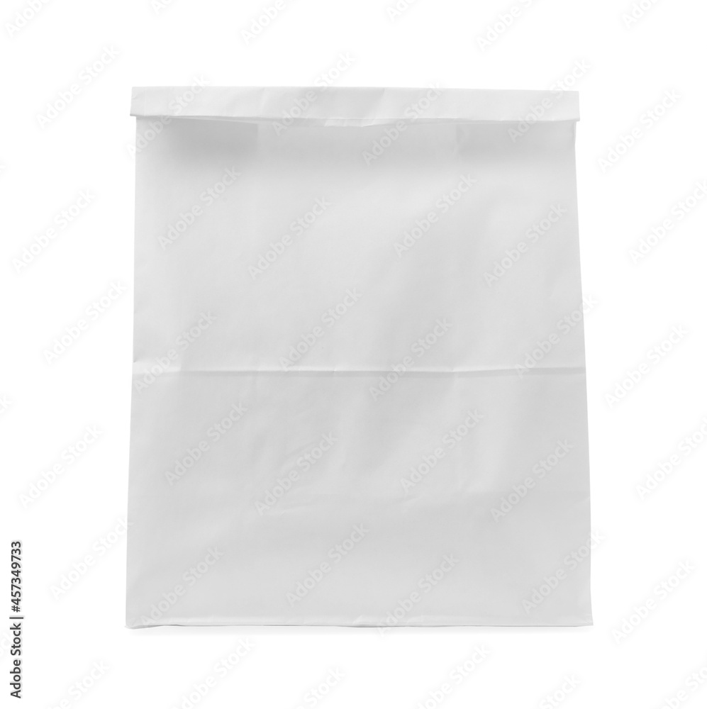 Closed paper grocery bag isolated on white Closed paper grocery bag isolated on white