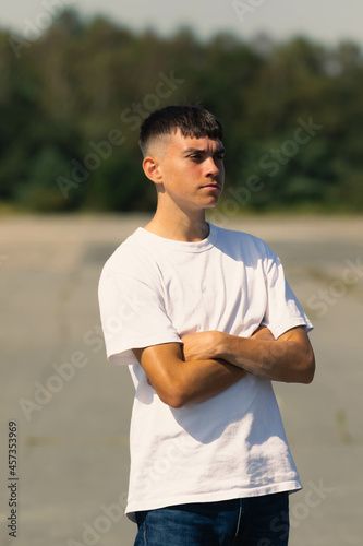 18 year old walking outdoors on a summer day