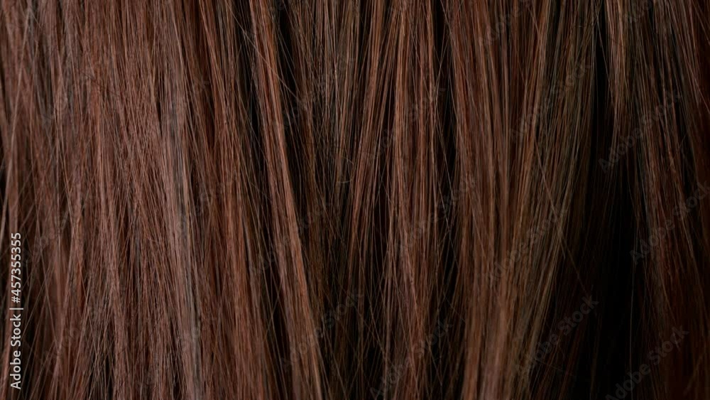 Super slow motion of beautiful healthy long smooth flowing brown hair. Filmed on high speed cinematic camera at 1000 fps. Super slow motion of beautiful healthy long smooth flowing brown hair. Filmed on high speed cinematic camera at 1000 fps.