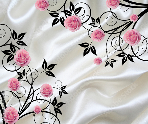 white folds of fabric with black patterns and pink rosebuds