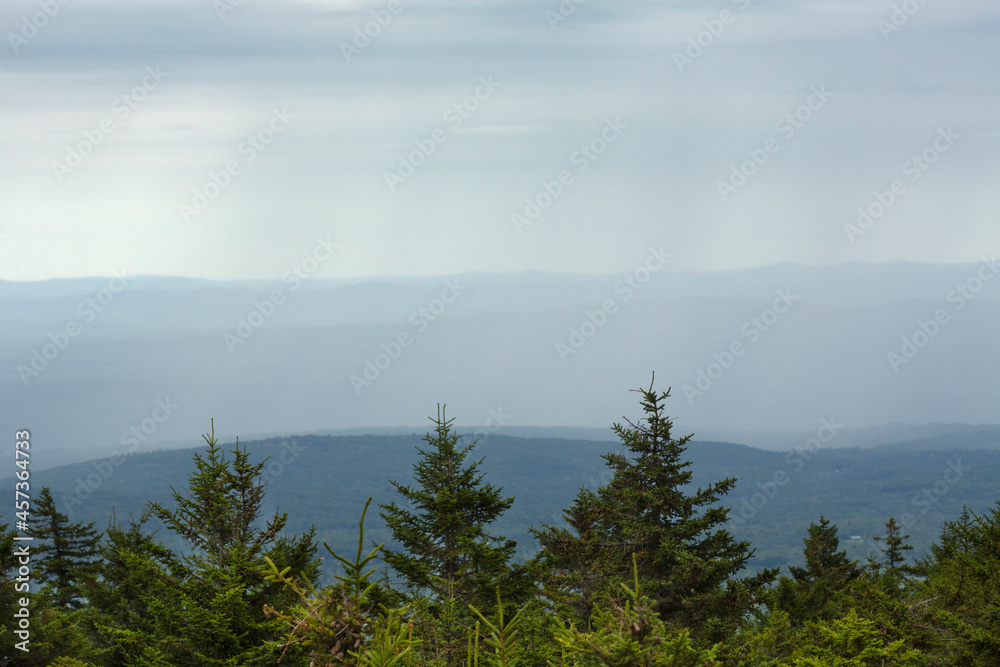 Rain shower in the valley, seen from Mt. Kearsarge summit.