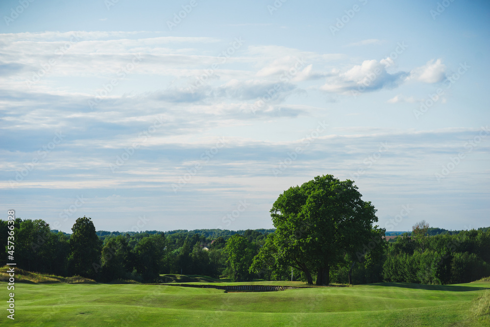 Links. Summer landscape overlooking the hills of the golf course.