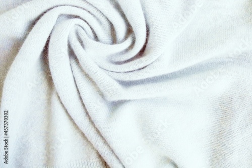 Cashmere texture, natural wool, draped, top view, concept of winter and autumn comfort