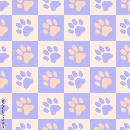 Vector seamless pattern of traces of cat paws on a chessboard. Lilac, violet, yellow, orange colors. For textiles, wrapping paper, napkins, backgrounds.