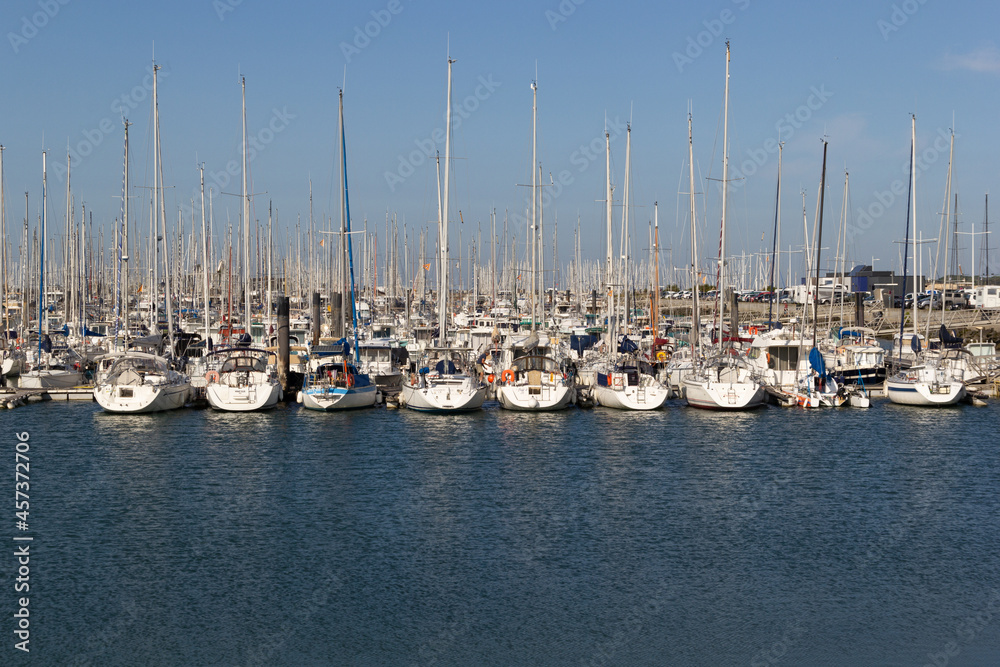 Boats and sailboats in the port in the city of La Rochelle in France