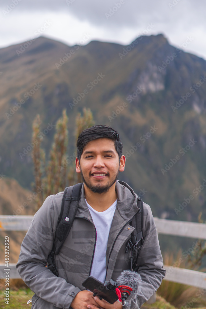 Young man enjoying the outdoors in the mountains. Young man enjoying the outdoors in the mountains.