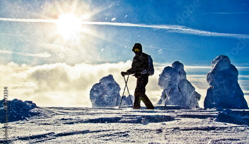 Man ski touring on a sunny day near Whistler, B.C., Canada. photo