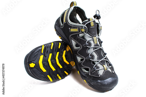 Sports sandals for men with elastic laces on white.