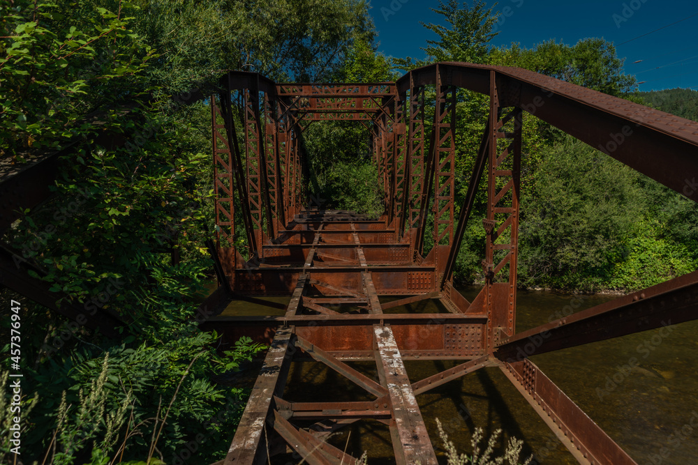 Old railway iron bridge near Liptovska Porubka village Old railway iron bridge near Liptovska Porubka village