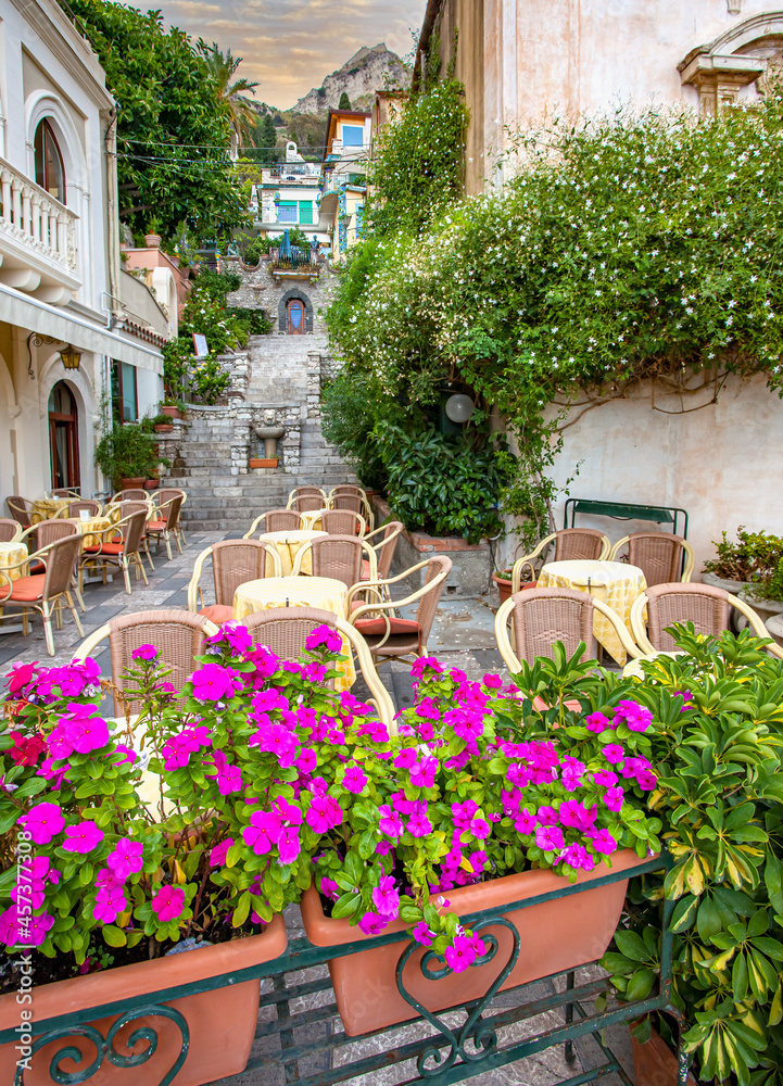 Outdoor restaurant ready for customers in Taormina