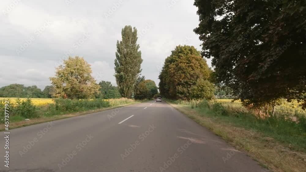 Car accelerates on the highway back view slow motion Car accelerates on the highway back view slow motion